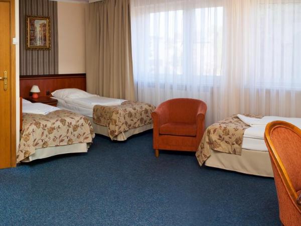 Załęże : photo 1 de la chambre chambre triple standard
