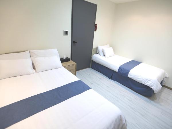 Must Stay Hotel Myeongdong : photo 4 de la chambre chambre triple