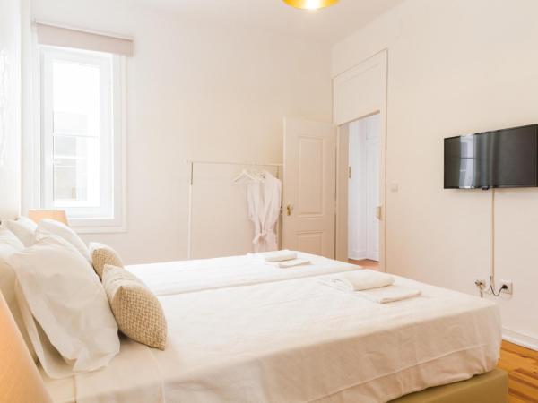 City Lofts Lisbon - Guesthouse : photo 1 de la chambre chambre lits jumeaux standard avec salle de bains commune
