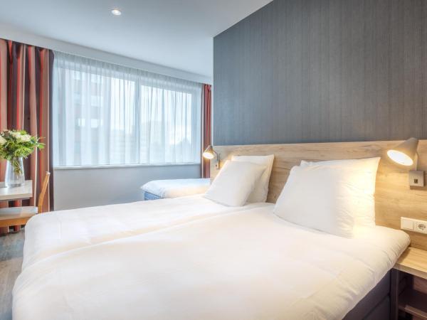 Joy Hotel : photo 9 de la chambre chambre triple deluxe