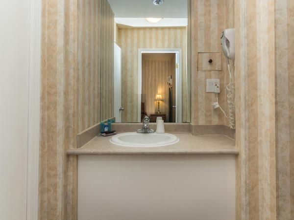 Canadas Best Value Inn Chinook Station : photo 7 de la chambre queen room with kitchenette - non smoking