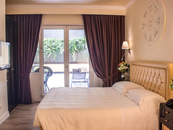 Hotel Patavium : photo 1 de la chambre chambre lit king-size confort avec terrasse