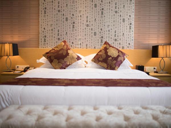 Suzhou Sun Plaza Hotel : photo 3 de la chambre chambre lit queen-size supérieure genius