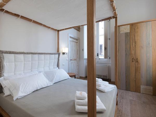 B&B Il Palazzotto Luxury Suites : photo 10 de la chambre chambre quadruple avec balcon 