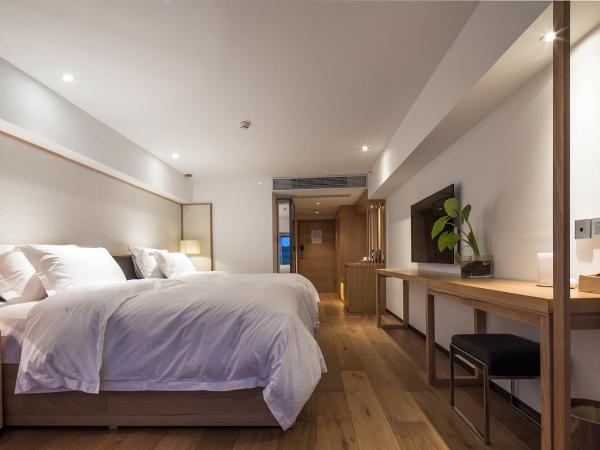 Bai Yun Qin She Boutique : photo 1 de la chambre chambre lits jumeaux deluxe - vue sur ville
