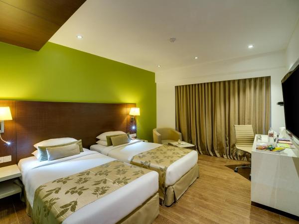 Ramee Grand Hotel and Spa, Pune : photo 2 de la chambre chambre lits jumeaux exécutive
