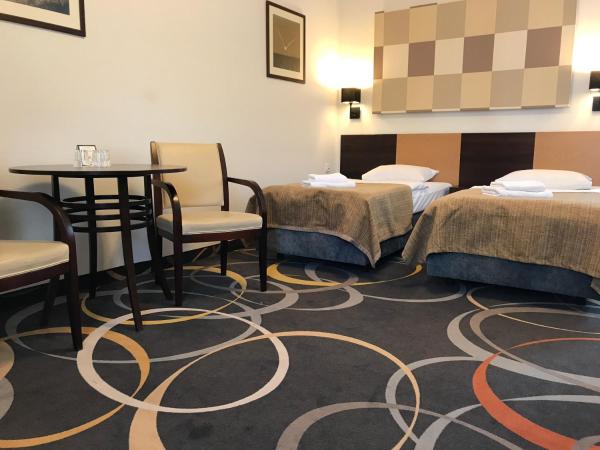 La Petite APARTMENTS & ROOMS : photo 2 de la chambre chambre triple