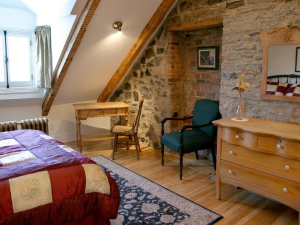 Manoir Sur le Cap : photo 1 de la chambre chambre lit queen-size