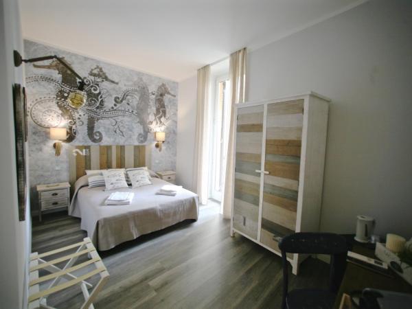 Echi del Mare : photo 6 de la chambre chambre double ou lits jumeaux deluxe avec balcon
