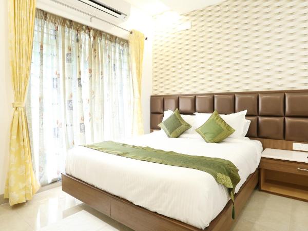 Treebo Pechis Castle : photo 2 de la chambre chambre double ou lits jumeaux standard [assainie]