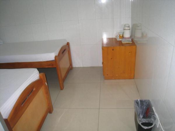 Hung Fai Guest House : photo 8 de la chambre chambre lits jumeaux