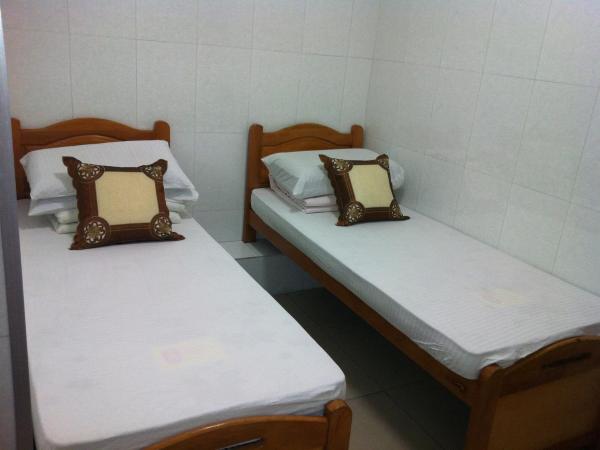 Hung Fai Guest House : photo 6 de la chambre chambre lits jumeaux