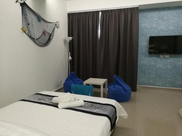 D' Cozy Inn : photo 8 de la chambre chambre quadruple avec salle de bains privative