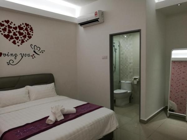 D' Cozy Inn : photo 5 de la chambre chambre double deluxe avec douche