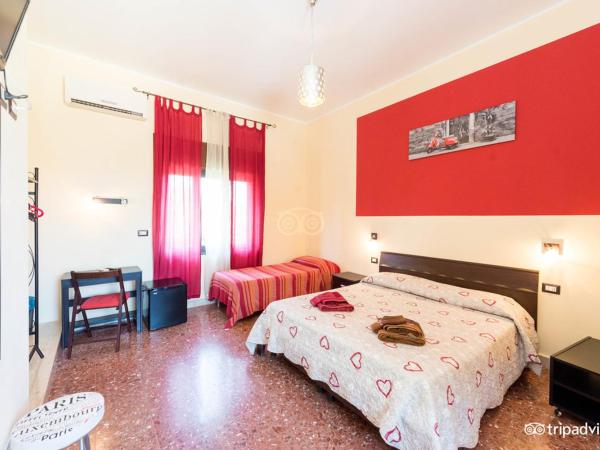 B&B Villa Pia : photo 1 de la chambre chambre double ou lits jumeaux avec lit d'appoint