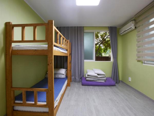 Hans House : photo 9 de la chambre chambre familiale avec salle de bains