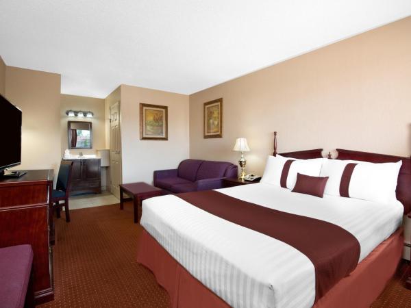 Howard Johnson by Wyndham Red Deer : photo 1 de la chambre chambre lit king-size - non-fumeurs