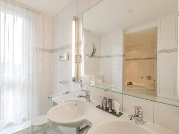 Metropole Swiss Quality Hotel : photo 1 de la chambre chambre double standard avec lit queen-size