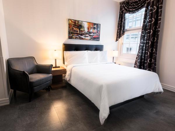 Hotel Manoir Morgan : photo 1 de la chambre chambre lit queen-size 