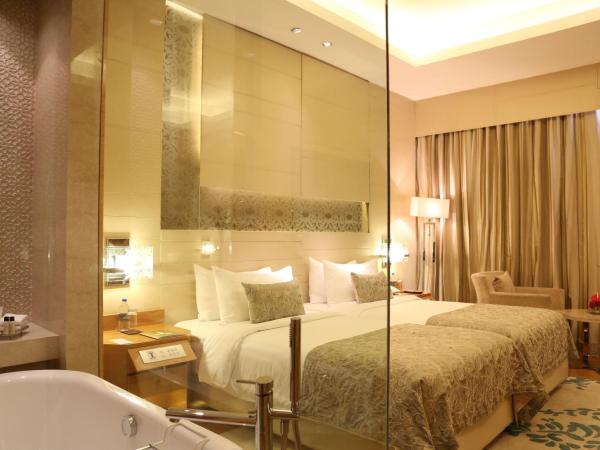 Taj City Centre Gurugram : photo 3 de la chambre chambre lits jumeaux deluxe