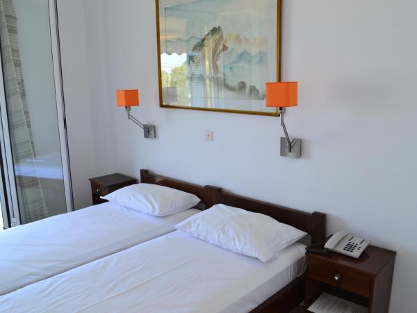 Villa Ioli : photo 1 de la chambre chambre lits jumeaux