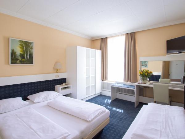 Pension Pharmador : photo 3 de la chambre chambre triple