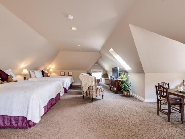 O Canada House Bed & Breakfast : photo 2 de la chambre chambre king avec 2 lits king size - dernier Étage