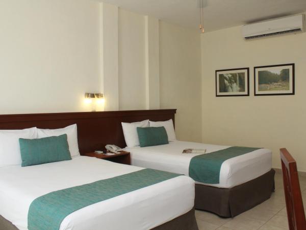 Mesón de la Luna Hotel & Spa : photo 3 de la chambre deluxe room with mini refrigerator and garden view, 2 double beds