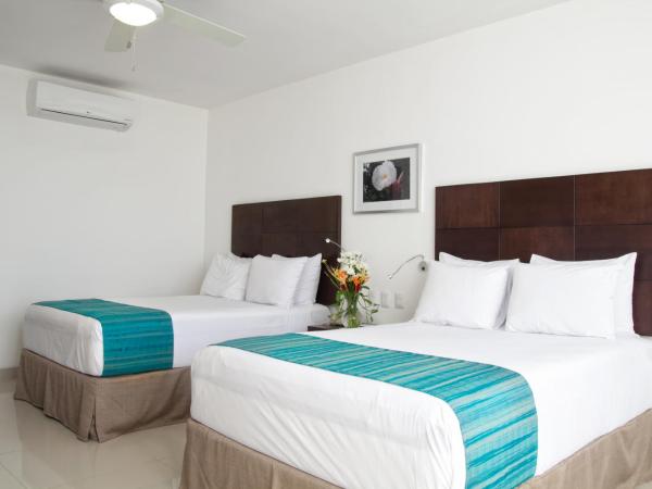 Mesón de la Luna Hotel & Spa : photo 4 de la chambre superior deluxe room with mini refrigerator and garden view, 2 double beds