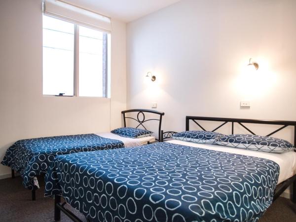 YHA Hobart Central : photo 5 de la chambre chambre double ou lits jumeaux avec salle de bains privative