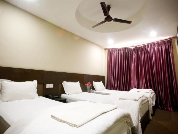 Hotel Nandini : photo 3 de la chambre chambre triple standard avec ventilateur