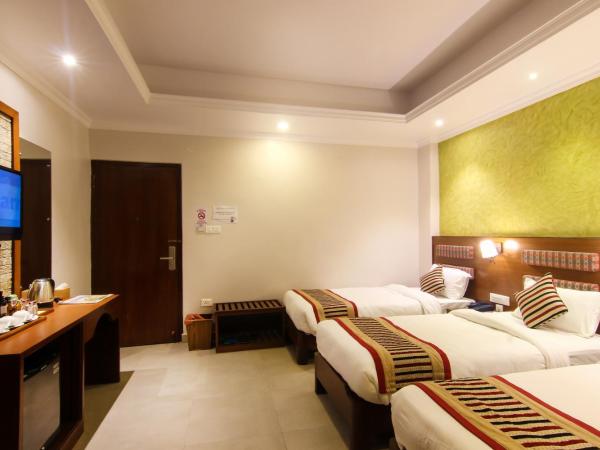 Kuti Resort & Spa : photo 1 de la chambre chambre triple