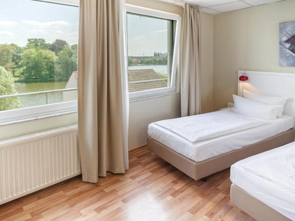 Hotel am Schloß Köpenick by Golden Tulip : photo 9 de la chambre chambre lits jumeaux standard