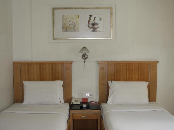 Hotel Stay Inn : photo 3 de la chambre fortune double or twin room
