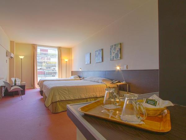 Uno Buenos Aires Suites : photo 1 de la chambre chambre triple supérieure