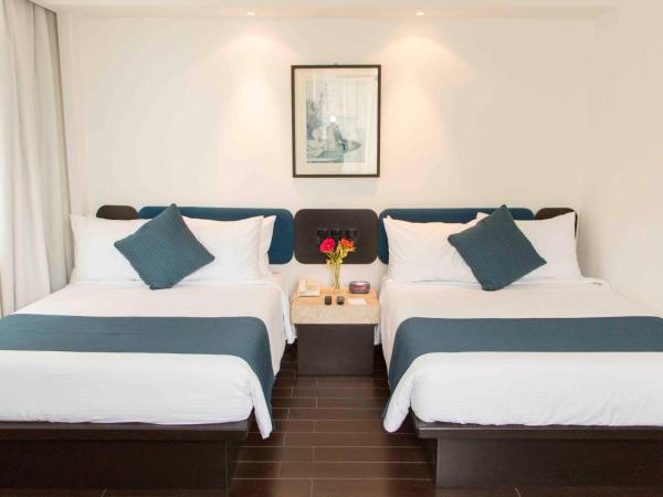 Hotel Real de Puebla : photo 1 de la chambre chambre lits jumeaux