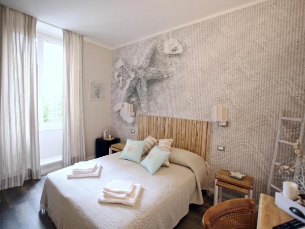 Echi del Mare : photo 3 de la chambre chambre deluxe double ou lits jumeaux