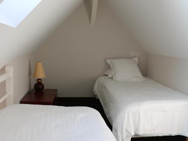 La Mere Champlain : photo 1 de la chambre chambre triple