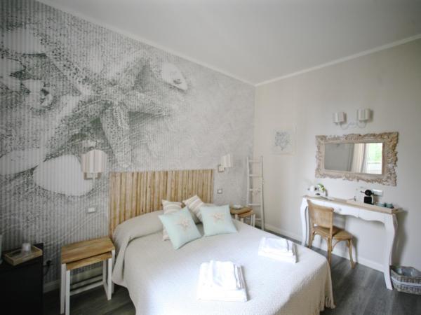 Echi del Mare : photo 2 de la chambre chambre deluxe double ou lits jumeaux