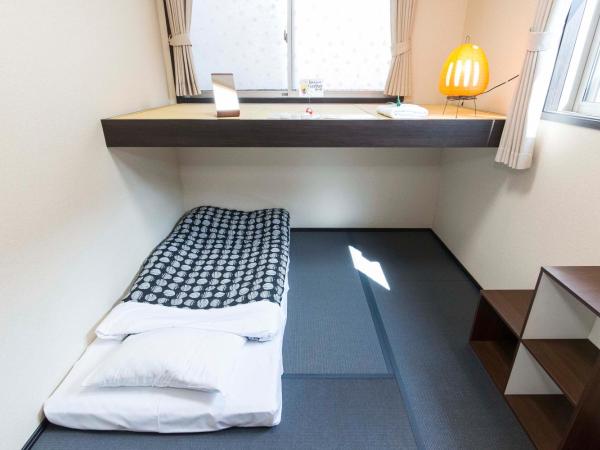 Fujitaya BnB : photo 1 de la chambre chambre lits jumeaux avec lit d’appoint - 301
