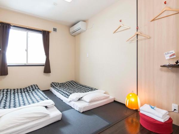 Fujitaya BnB : photo 6 de la chambre chambre lits jumeaux standard avec salle de bains commune