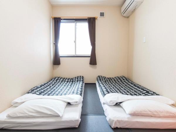 Fujitaya BnB : photo 2 de la chambre chambre lits jumeaux standard avec salle de bains commune