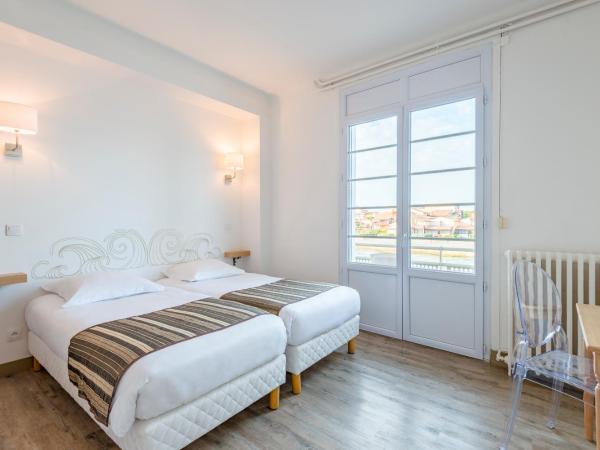 Hôtel Océan : photo 3 de la chambre chambre lits jumeaux océan