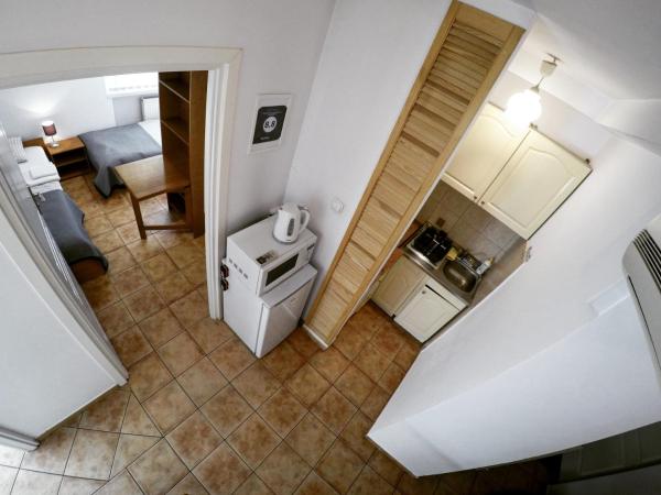 Pokoje gościnne przy Ogrodzie Staromiejskim : photo 2 de la chambre chambre lits jumeaux