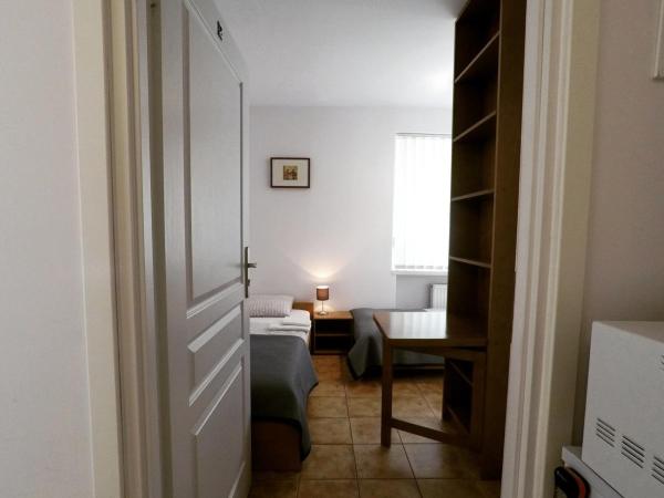 Pokoje gościnne przy Ogrodzie Staromiejskim : photo 7 de la chambre chambre lits jumeaux