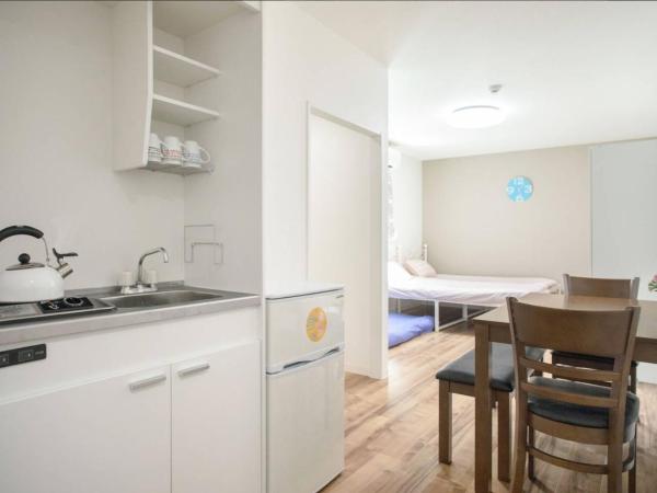 Osaka Tsuruhashitei Hotel Asahi group 大阪鶴橋亭ホテル : photo 1 de la chambre chambre quadruple avec salle de bains privative