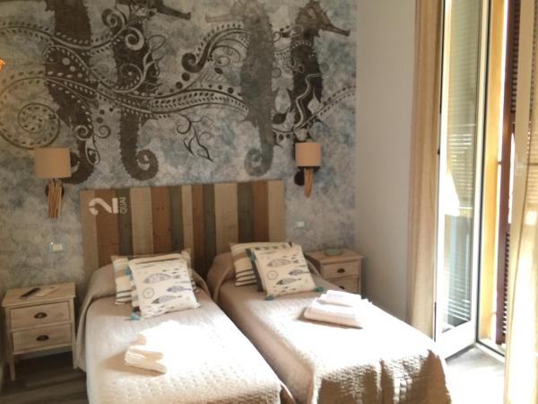 Echi del Mare : photo 5 de la chambre chambre double ou lits jumeaux deluxe avec balcon