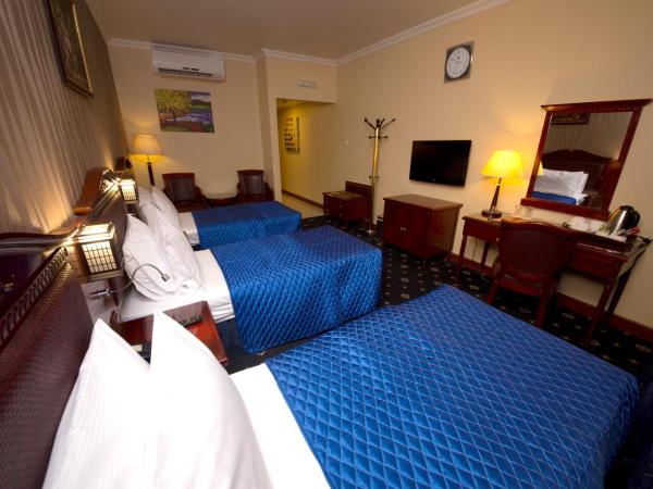 Mount Royal Hotel : photo 1 de la chambre chambre triple deluxe