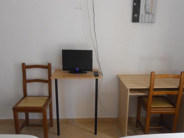 Hostal El Descanso : photo 8 de la chambre chambre lits jumeaux