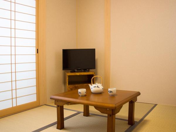 Kamoya Ryokan : photo 1 de la chambre chambre double